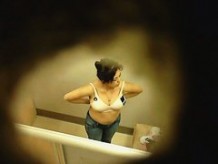 Chicks trying on bras caught by hidden camera in changing rooms