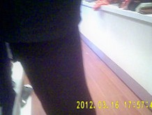 Sexy store girl in shiny black tights-2