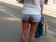 Girl of nice ass in shorts