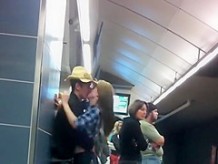 Making out in the subway station